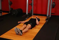 Développé sol un bras kettlebell