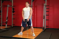 Squat plié haltère