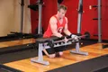 Curl poignets barre supination sur banc