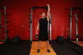 Moulin à vent avec double kettlebell