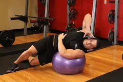 Flexion latérale avec ballon lesté