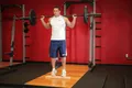 Élévations mollets barre debout