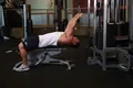 Lying Close-Grip Bar Curl On High Pulley