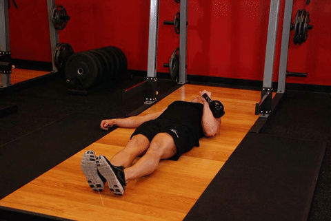 Développé sol un bras kettlebell
