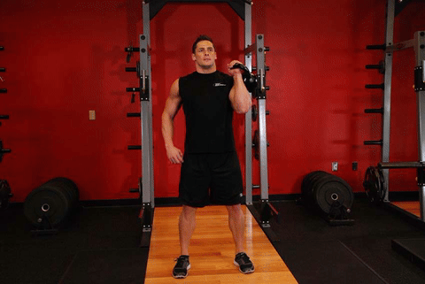 Développé militaire un bras kettlebell latéral