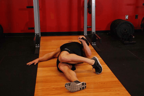 Développé sol un bras kettlebell amplitude étendue