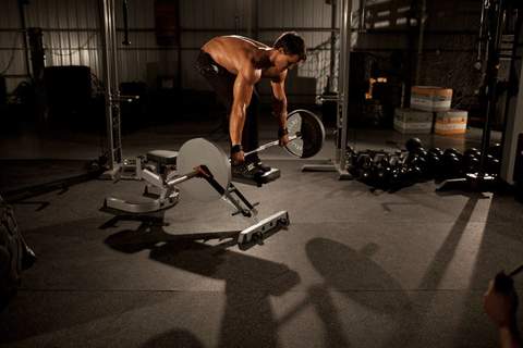 Rowing barre droite sur banc